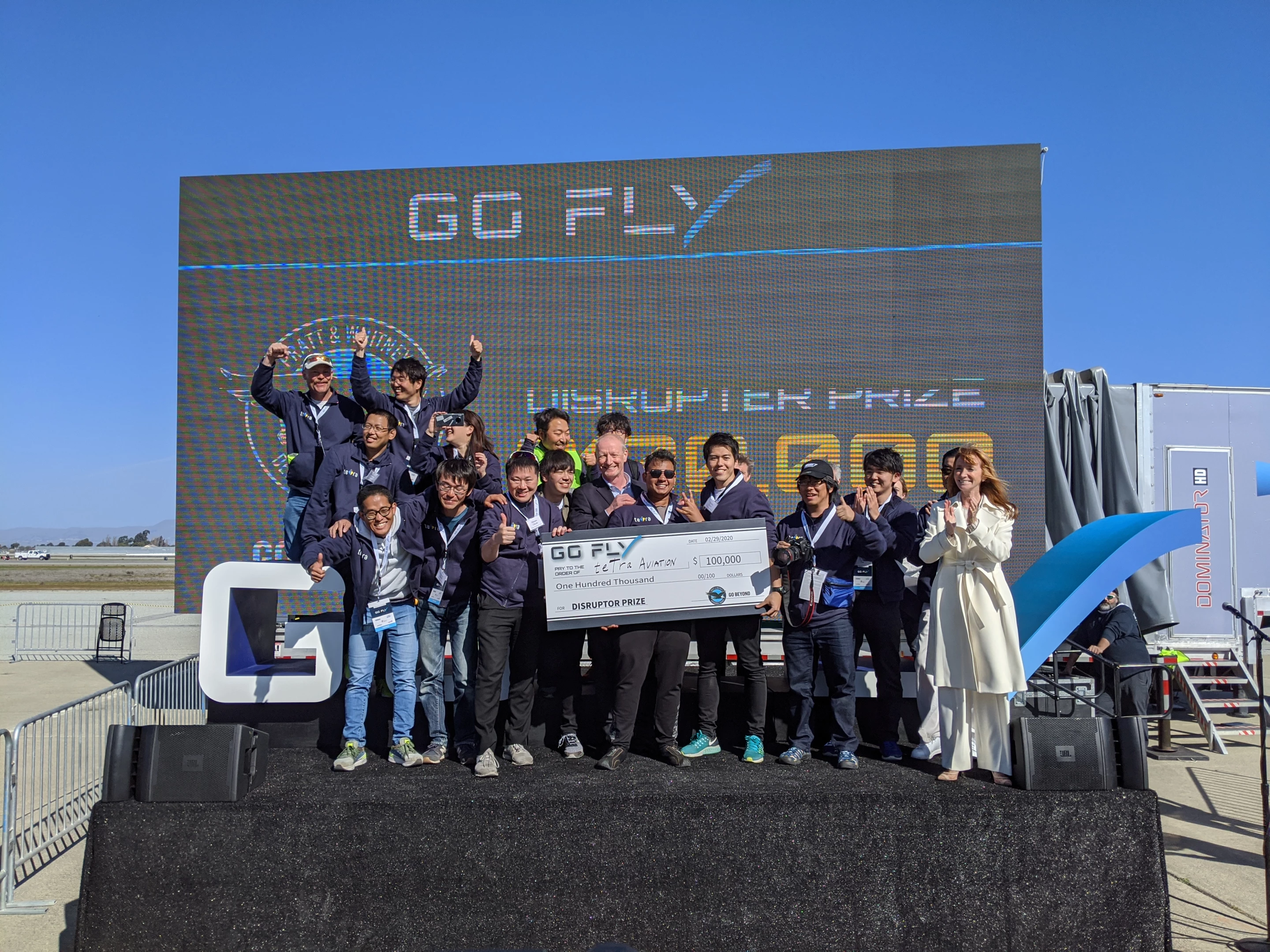 Japan's Tetra Aviation team celebrates its US$100,000 win