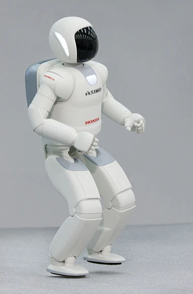 ASIMO hopping on one leg and moving forward