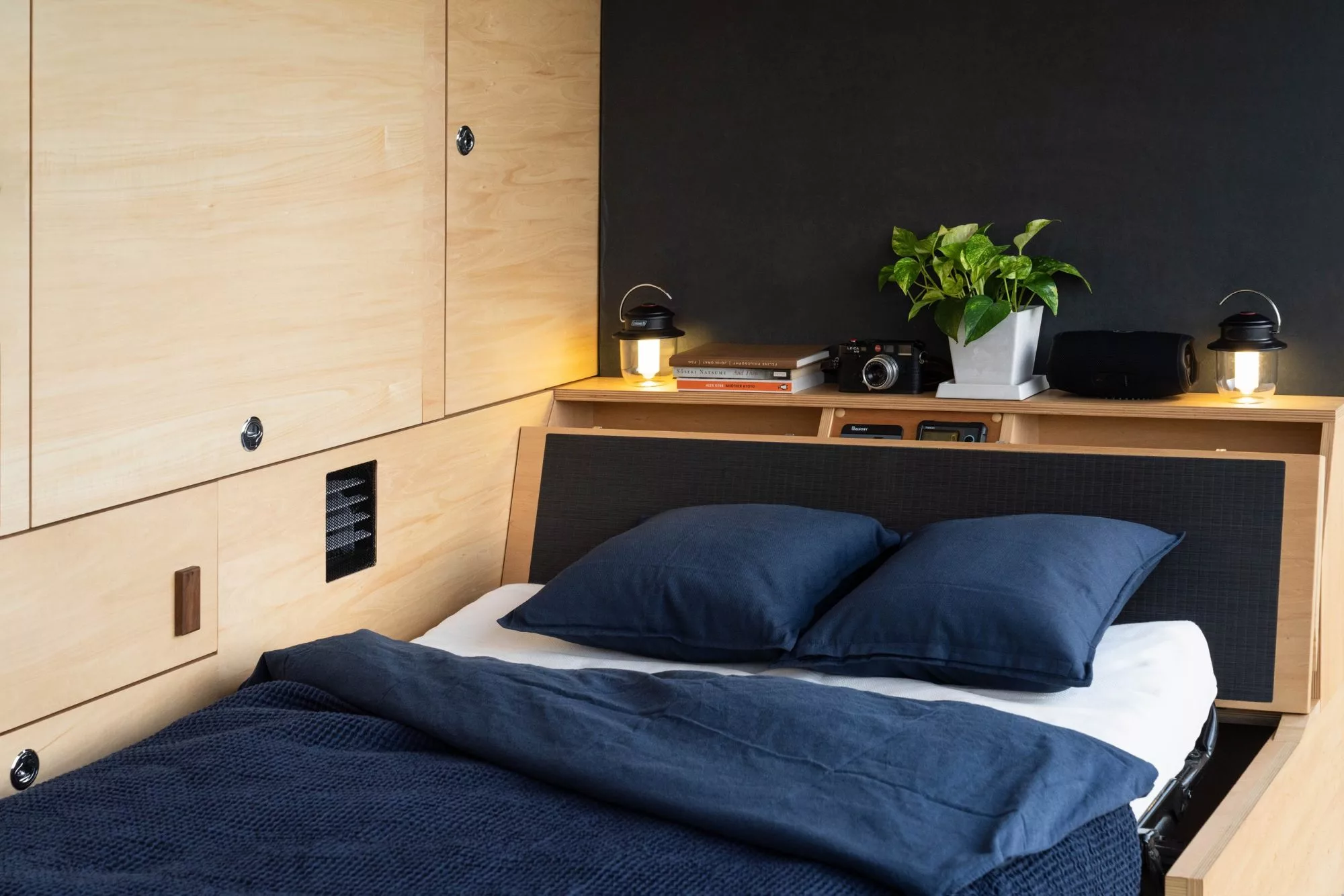 The office transforms into a bed at night, sleeping two people