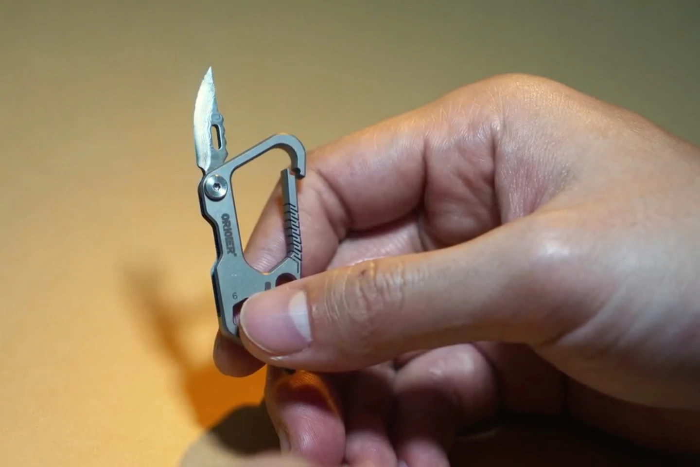 The Damascus steel blade is 30 mm (1.2 inches) in length