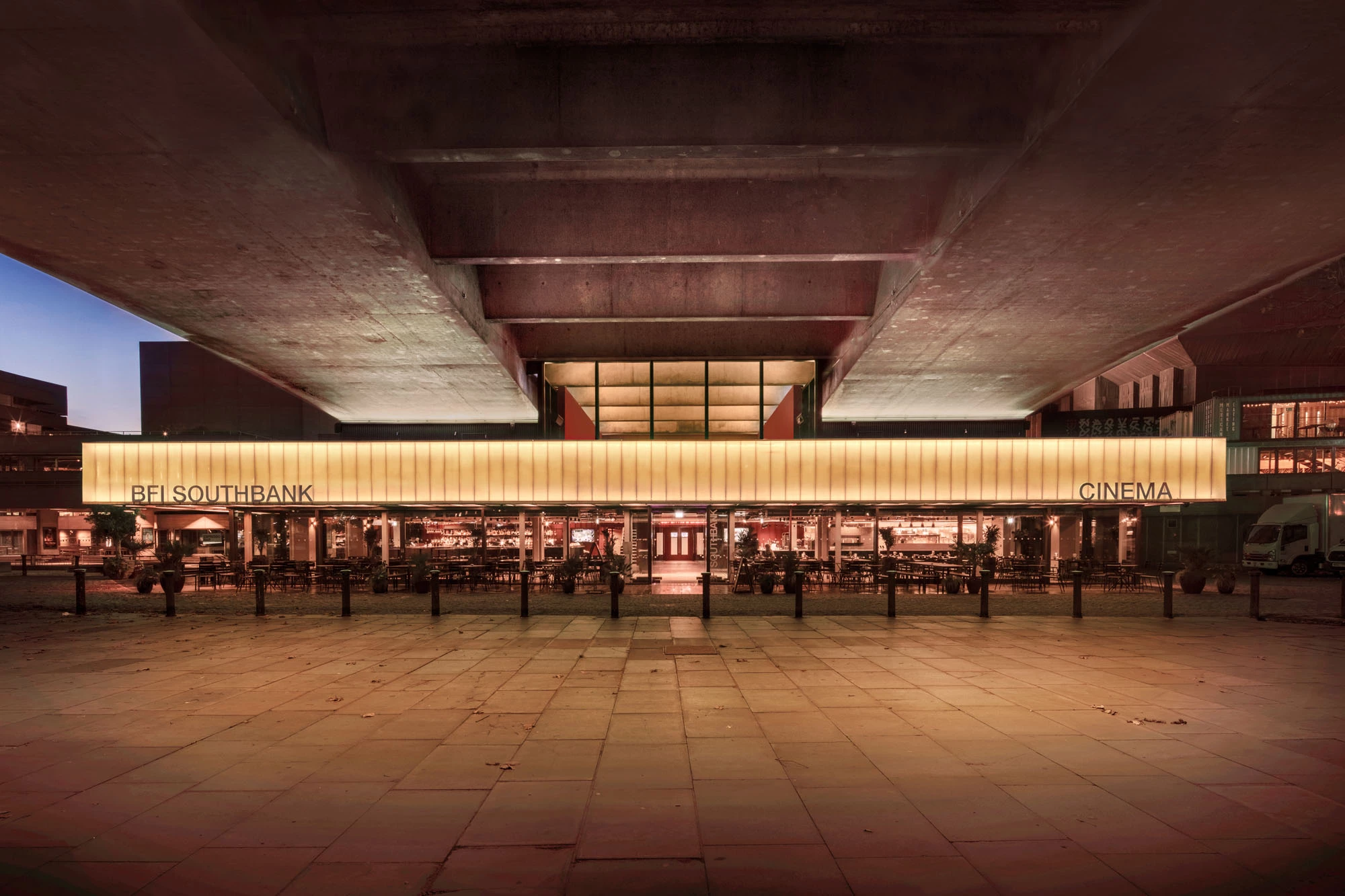 BFI Riverfront was designed by Carmody Groarke and is located in London. The project involved renovating the premises for the British Film Institute, exposing existing concrete beams and improving light and views