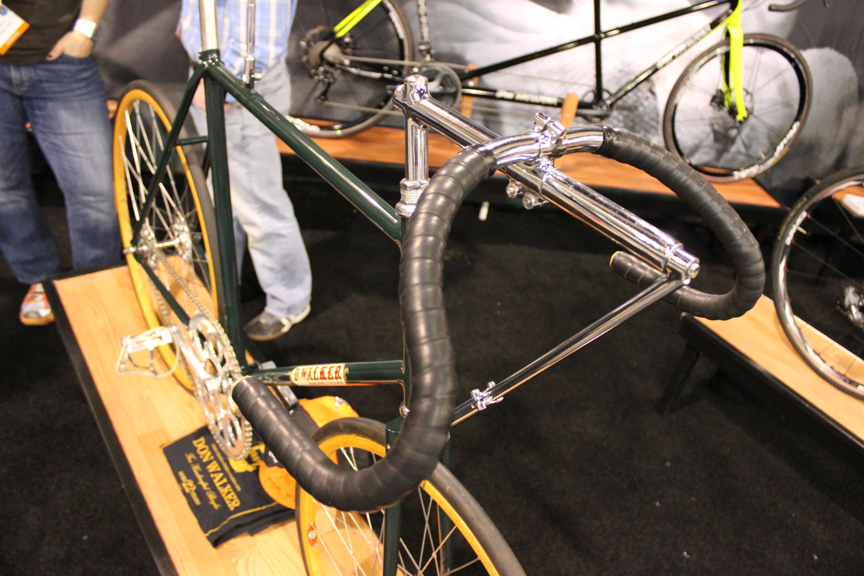 Stayer racing is performed on a velodrome track, with riders tucked in behind motorcycles to reach otherwise-unattainable speeds