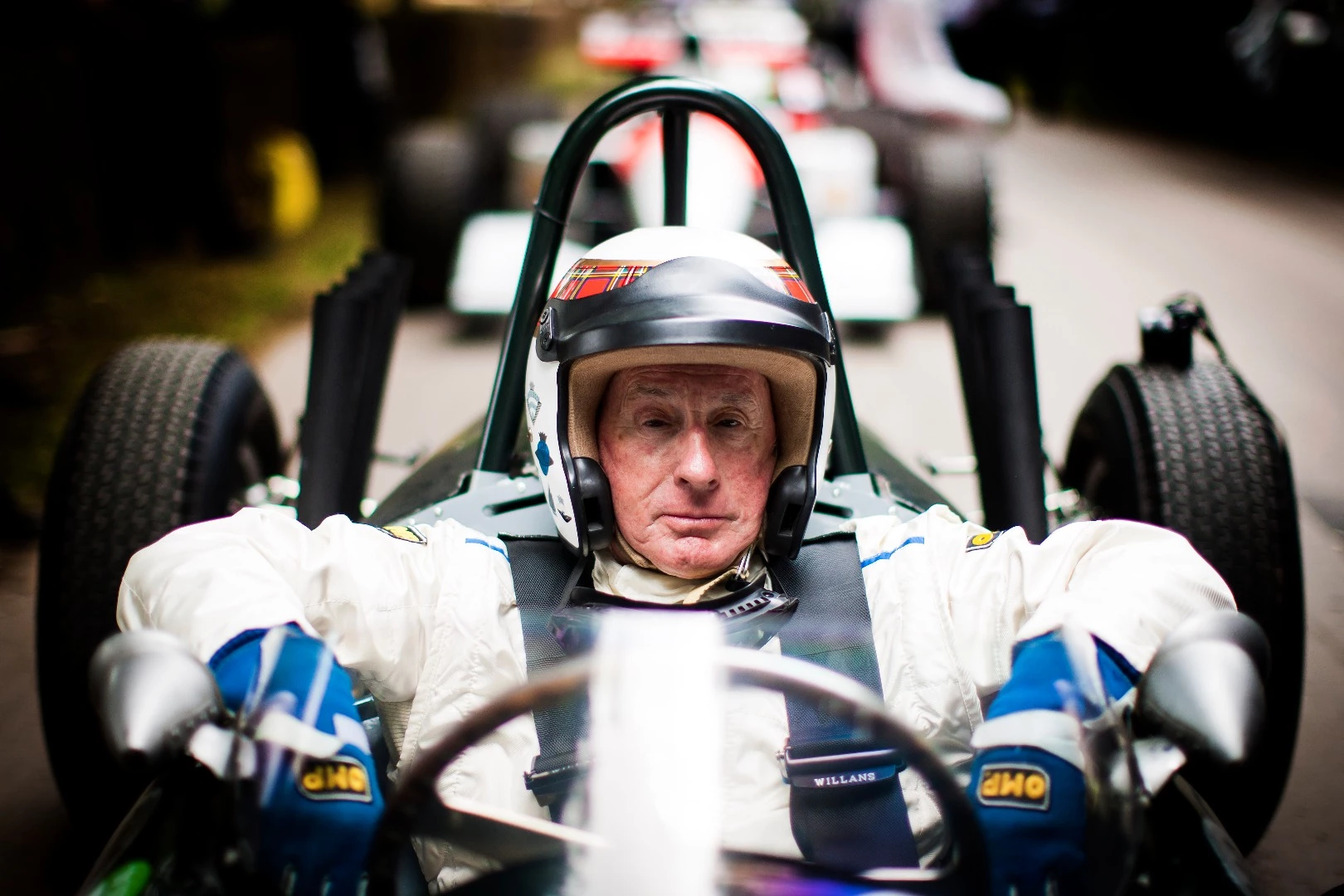 Sir Jackie Stewart gets behind the wheel at the Goodwood Festival of Speed