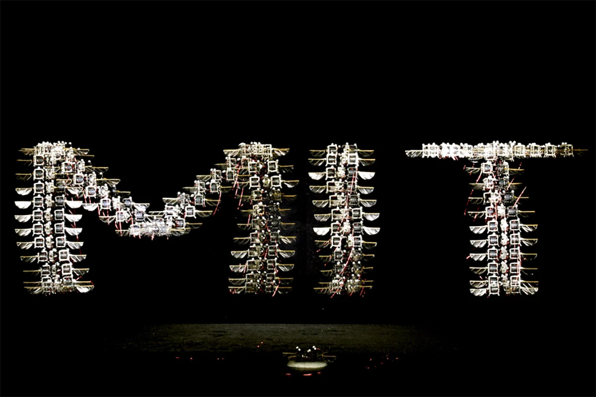 The redesigned microbot is already capable of somersaults and precise trajectories, like tracing the letters M-I-T as seen in the multi-exposure shot