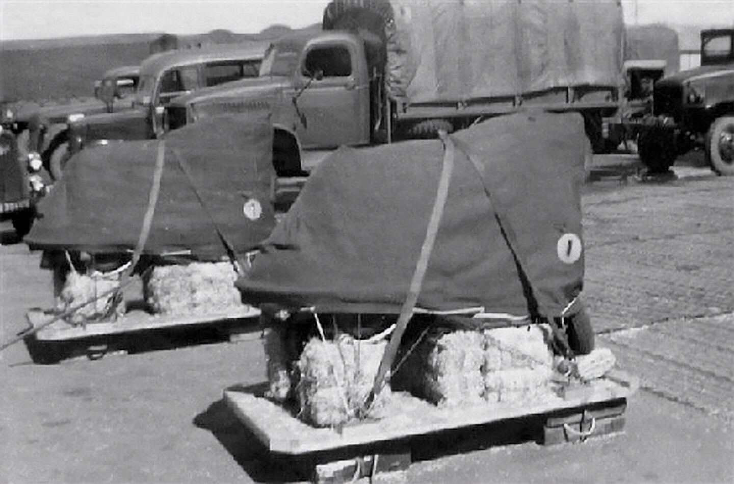 This is the way the Vespa TAP was packaged for air drops, wrapped in a tarpaulin and surrounded by hay bales to protect it when landing.