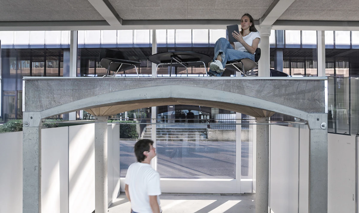 Unfold Form designer Lotte Scheder-Bieschin sitting atop a fan-vaulted floor built using her formwork