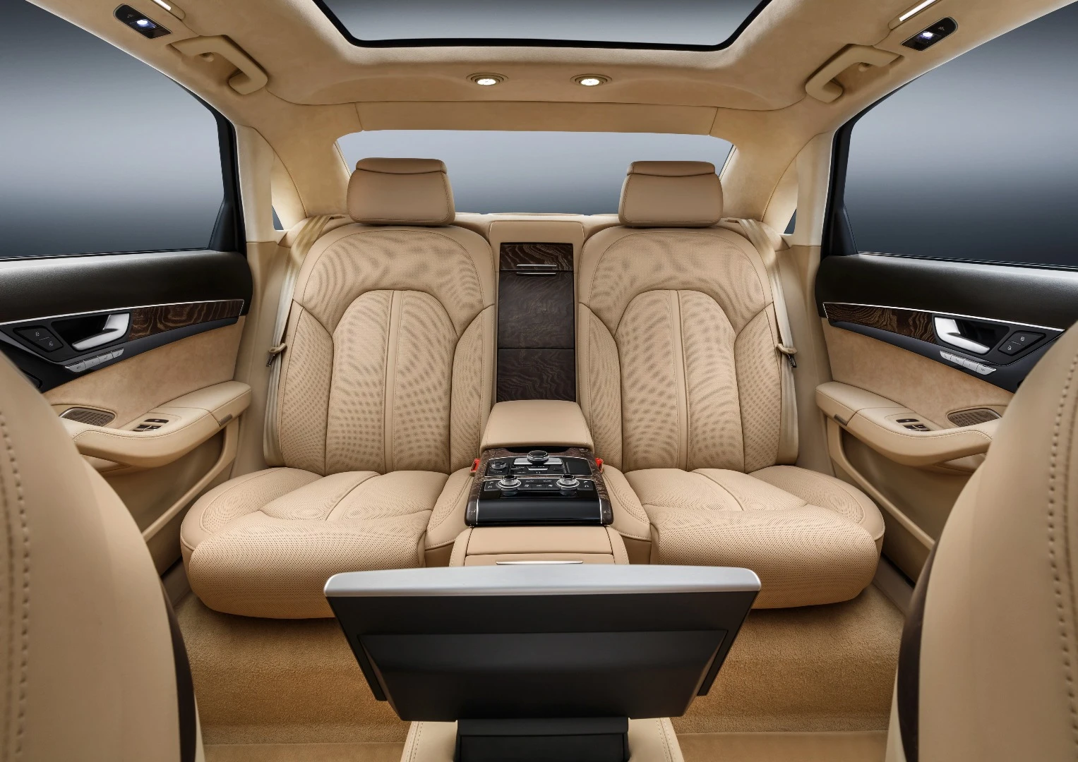Rear seat passengers are treated to adjustable, supple leather seats