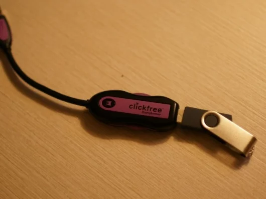Clickfree's Transformer cable sits between your PC and USB drive