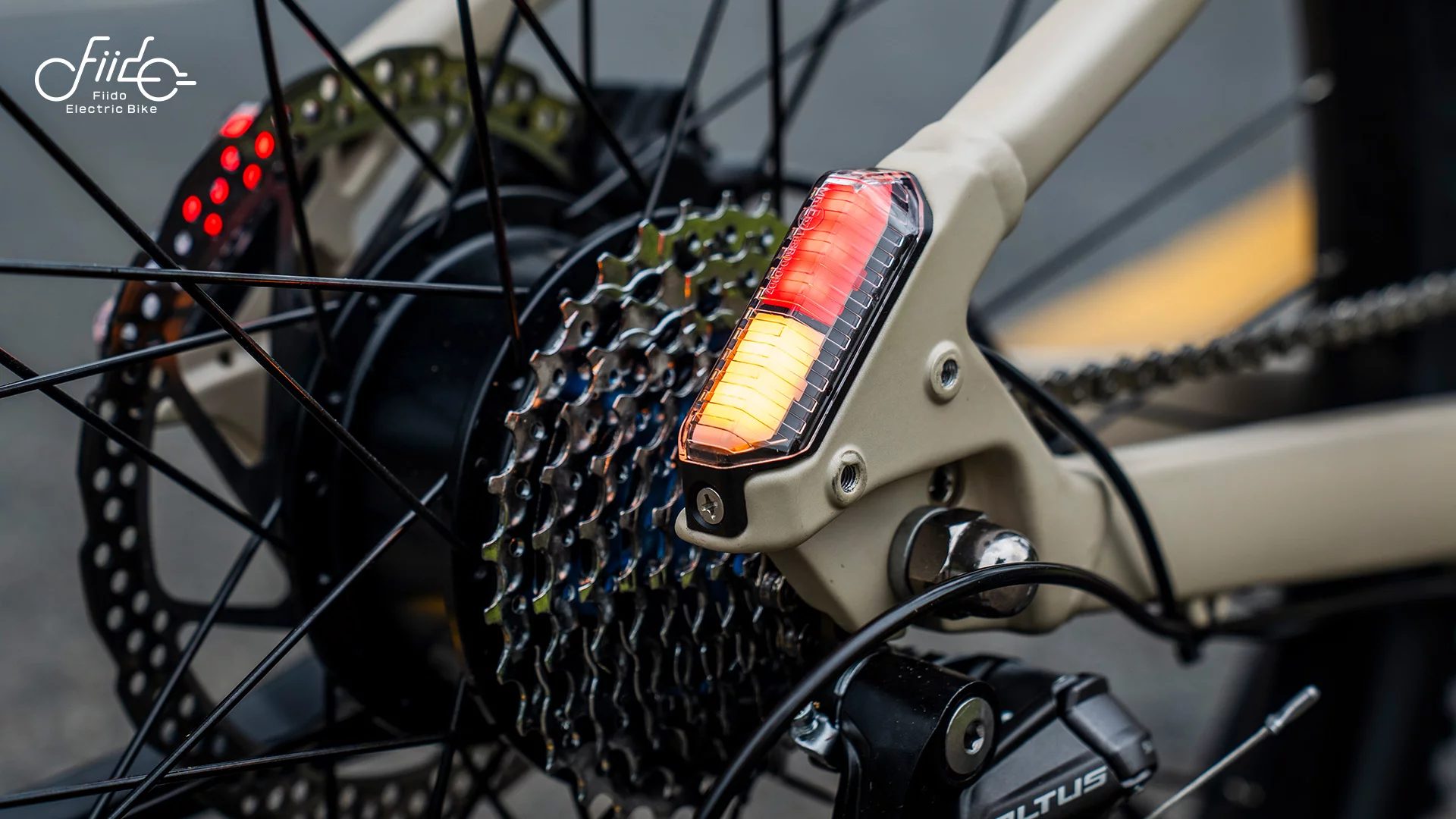 Twin rear tail-light integrated into the frame plus turn signaling