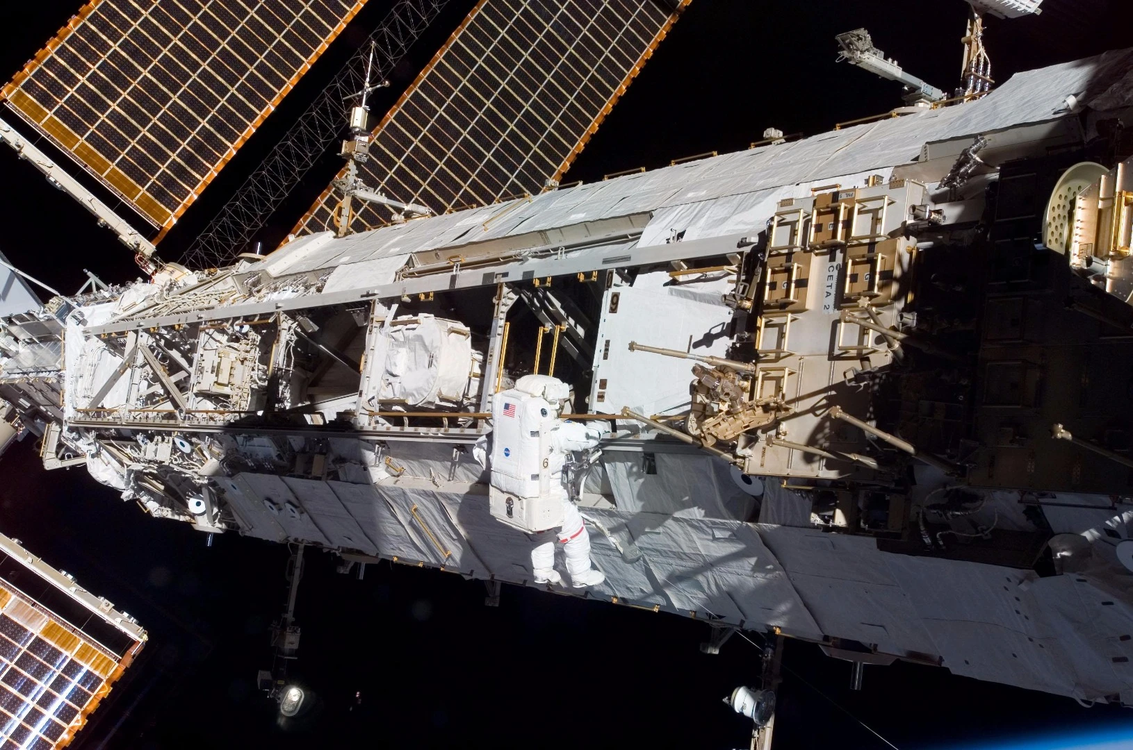 The EMU being used for space station maintenance