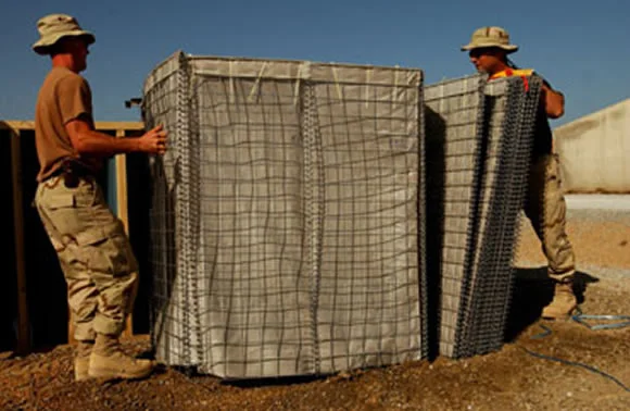 Solidiers assembling a Hesco Bastion cell
