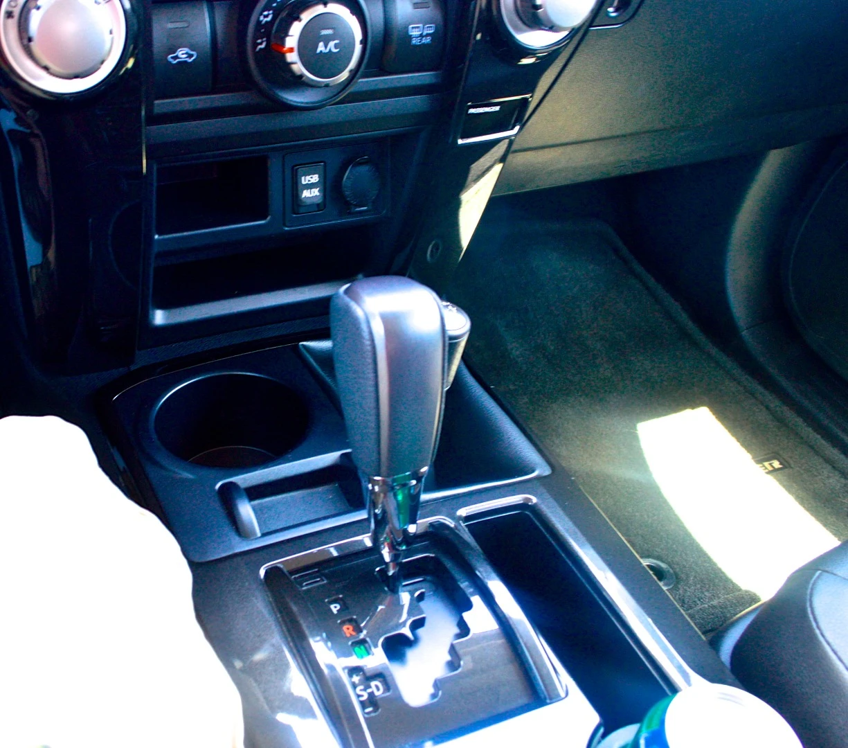 Among the first things we noticed were those chunky dials and the physical 4WD shifter hiding right behind the transmission shifter