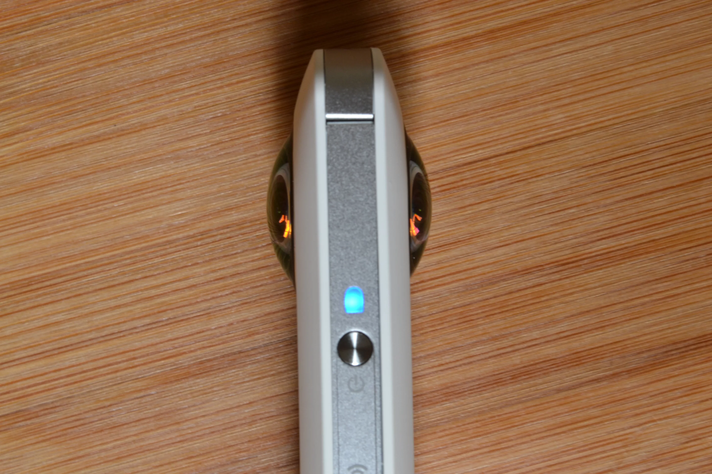 Side view showing both Theta lenses