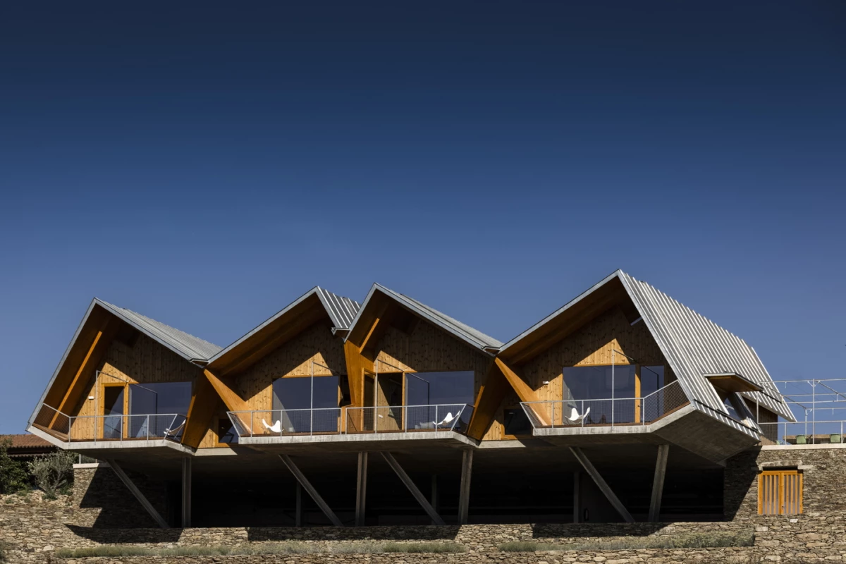 The building's unique foundation reduces its footprint on the land