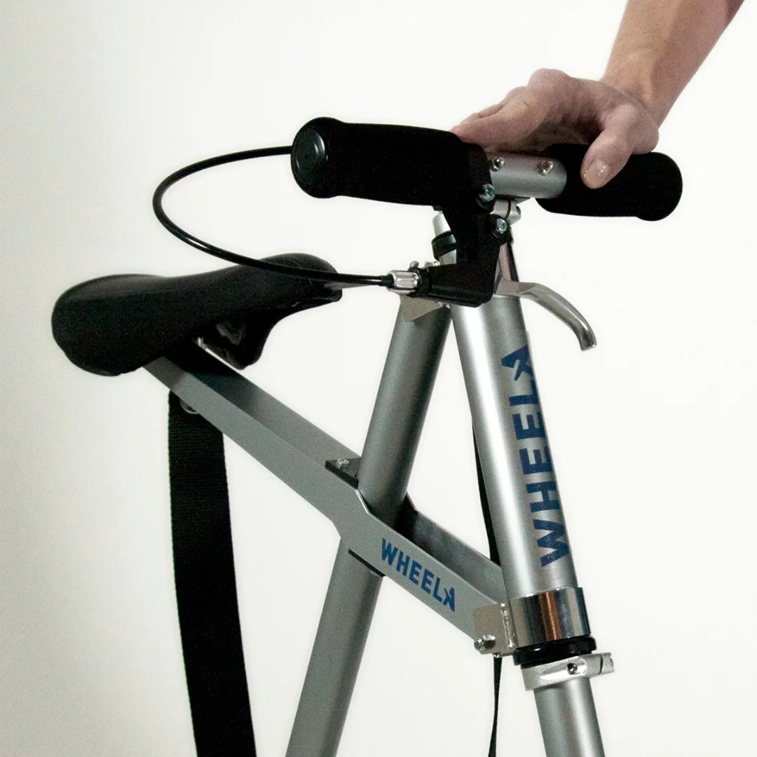 The Wheela collapses along the center bar then locks in place