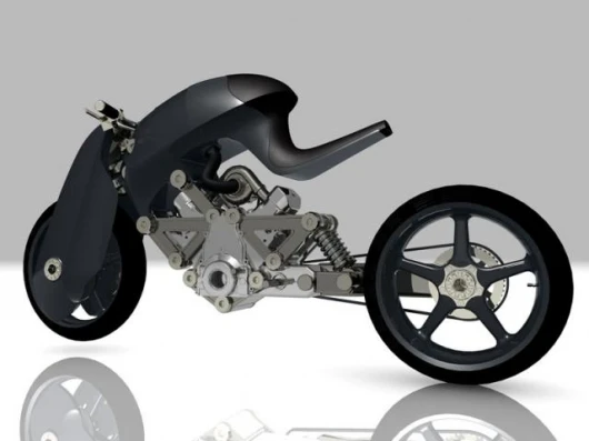 Retains the Wraith’s carbon-fiber girder fork concept and tractor-style seat