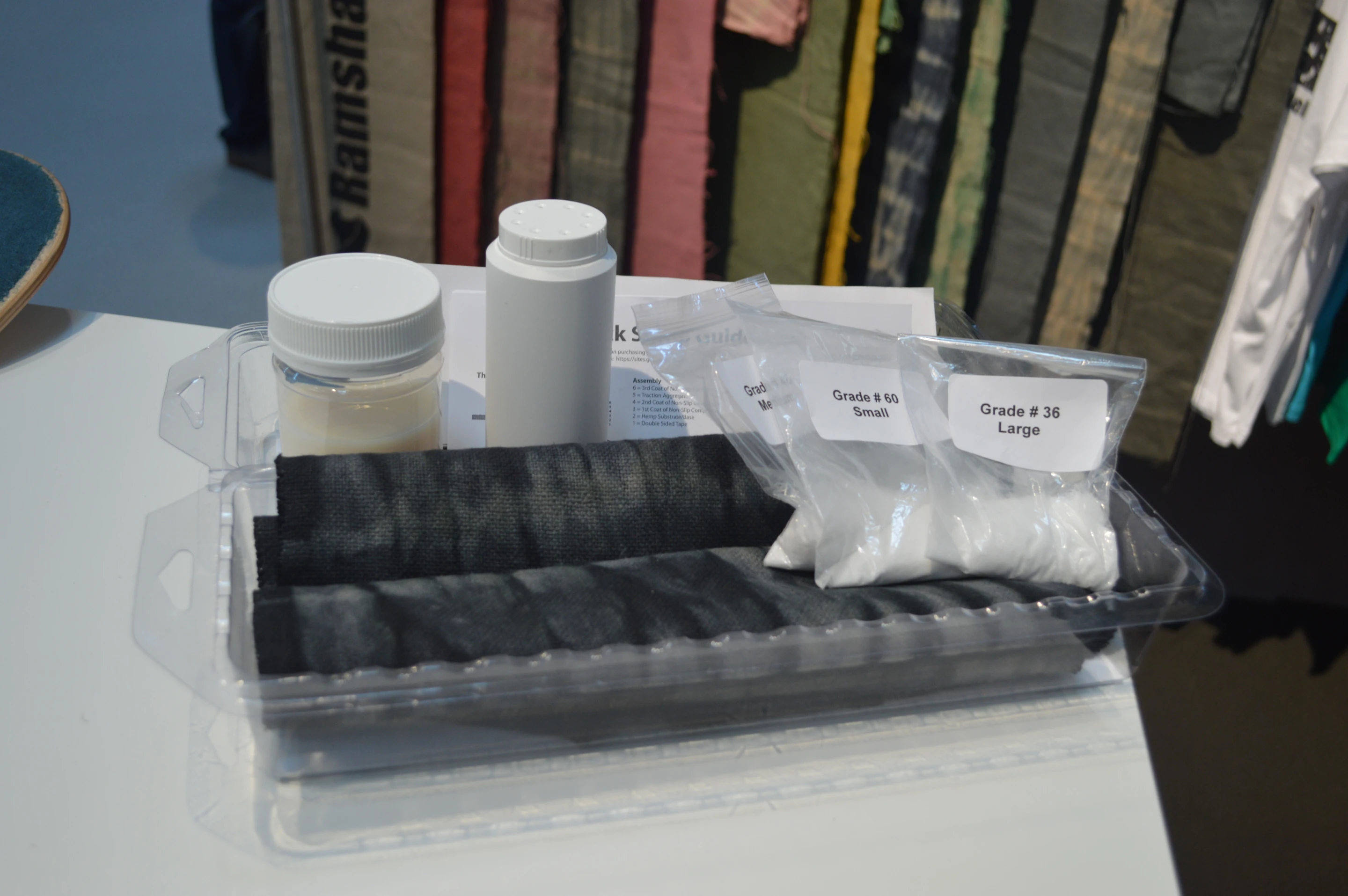 The kit includes the fabric, two-sided tape, compound and several grades of grip aggregate
