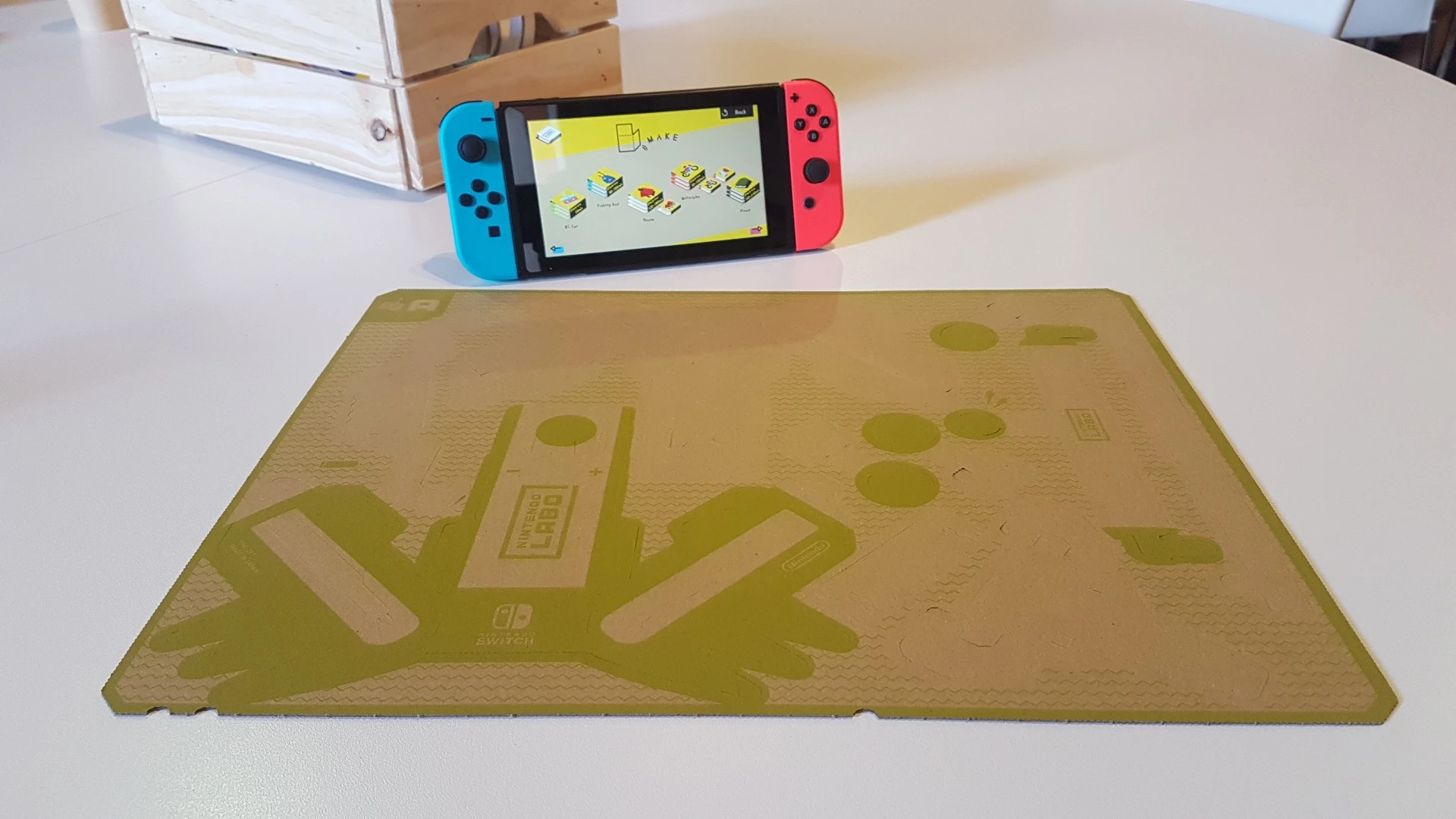 The Nintendo Labo process starts with a sheet of cardboard