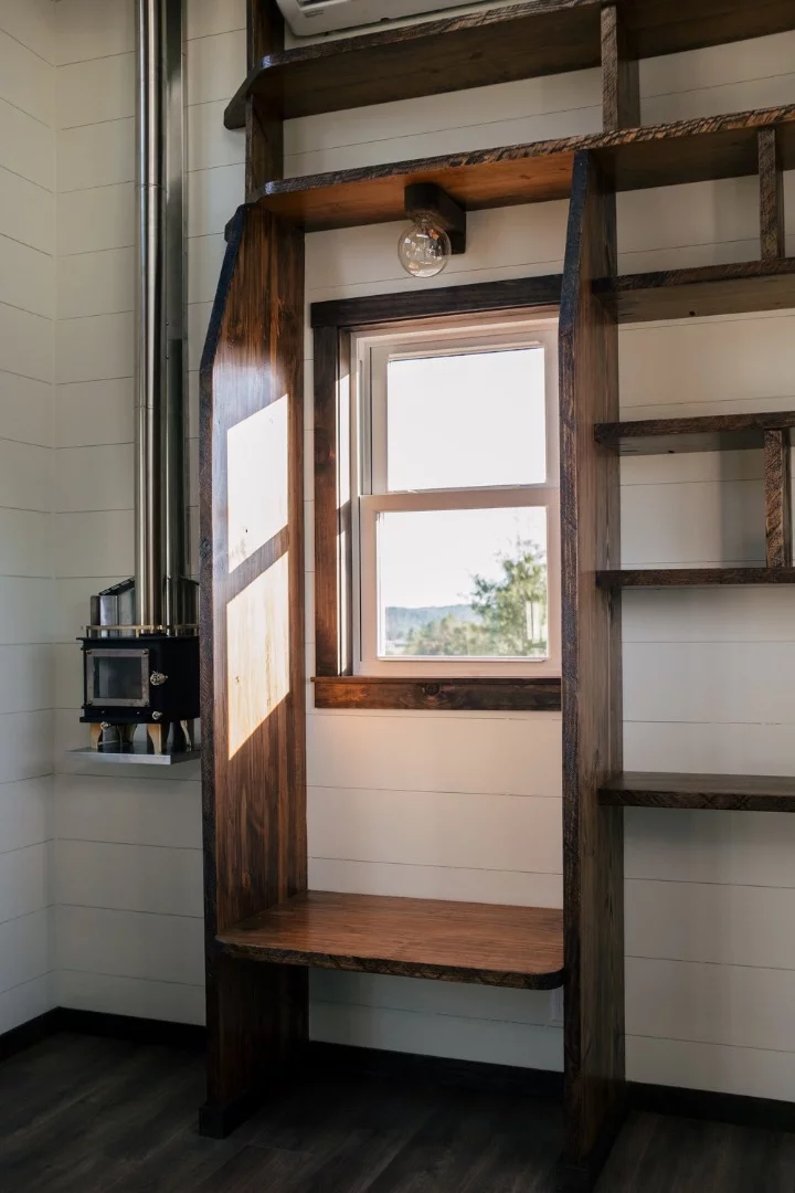 The Silhouette's reading nook, next to a small wood-burning stove