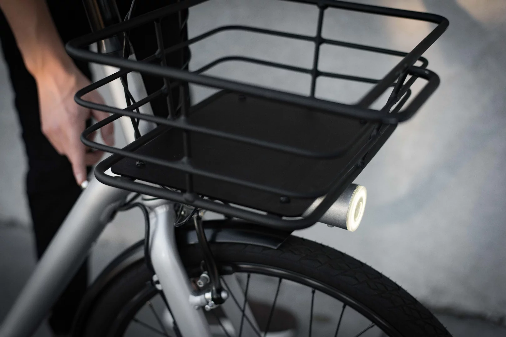 The Capacita's front basket is roomy enough to transport a "briefcase, a case of beer, or all the stuff for setting up Steve’s surprise party"