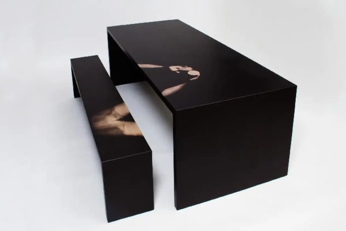 A new thermochromic table and bench set changes color wherever it's exposed to the user's body heat