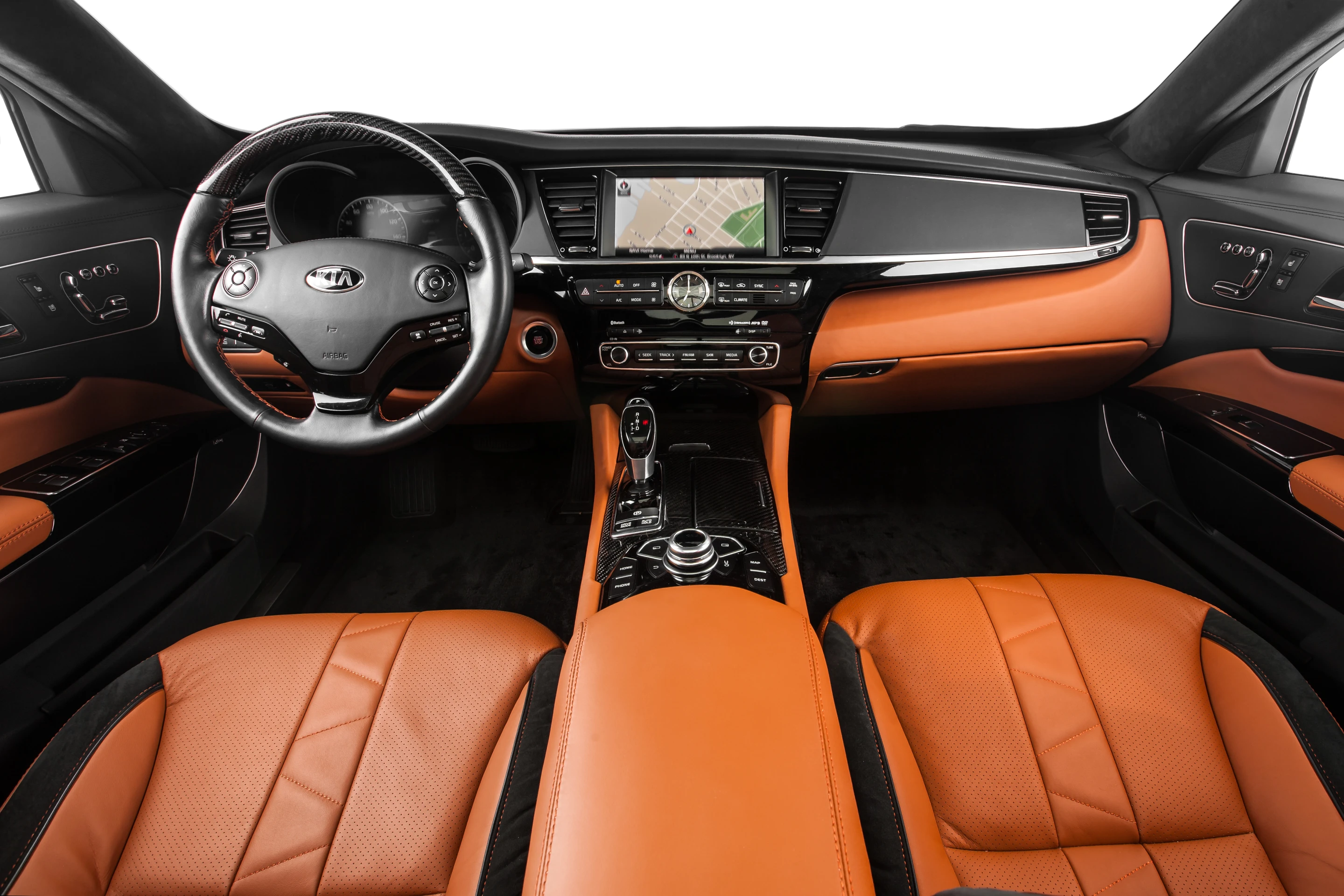 The K900's interior is trimmed in tan leather
