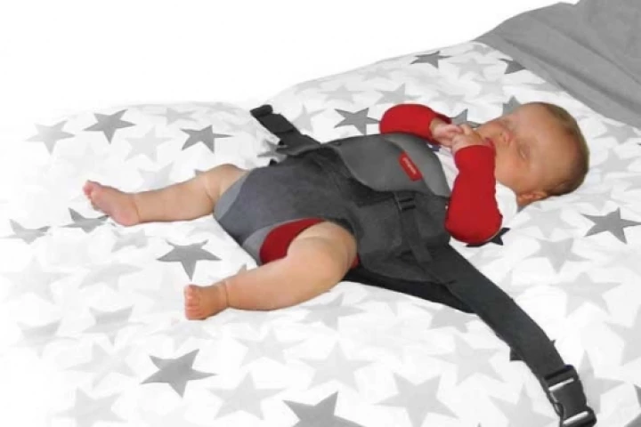 Wriggle Wrapper keeps baby secure whilst sleeping...