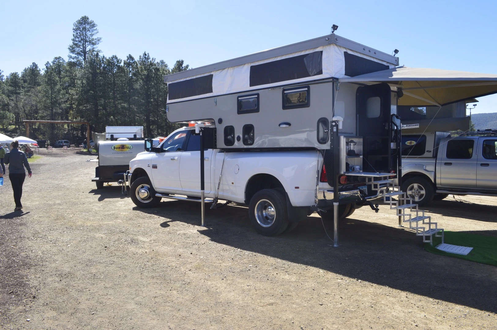 BundutecUSA's larger slide-in pickup campers are more complete camping solutions out of the box, but also heavier and more expensive