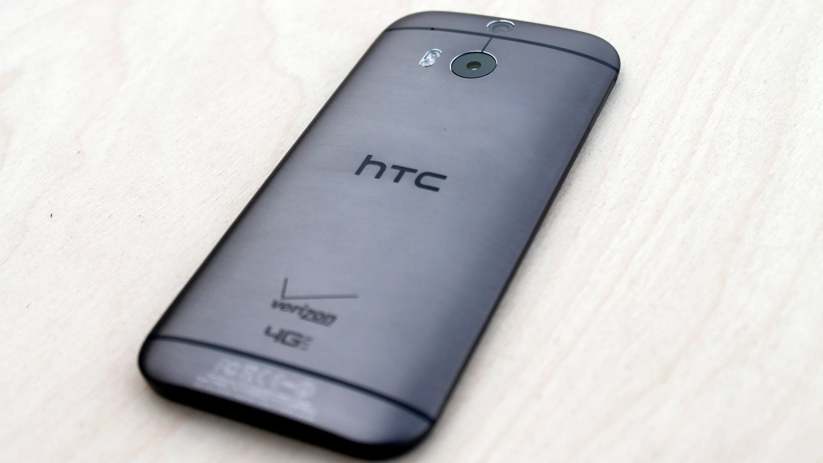 Unfortunately, the Verizon version has a logo splashed on the bottom of the One's back