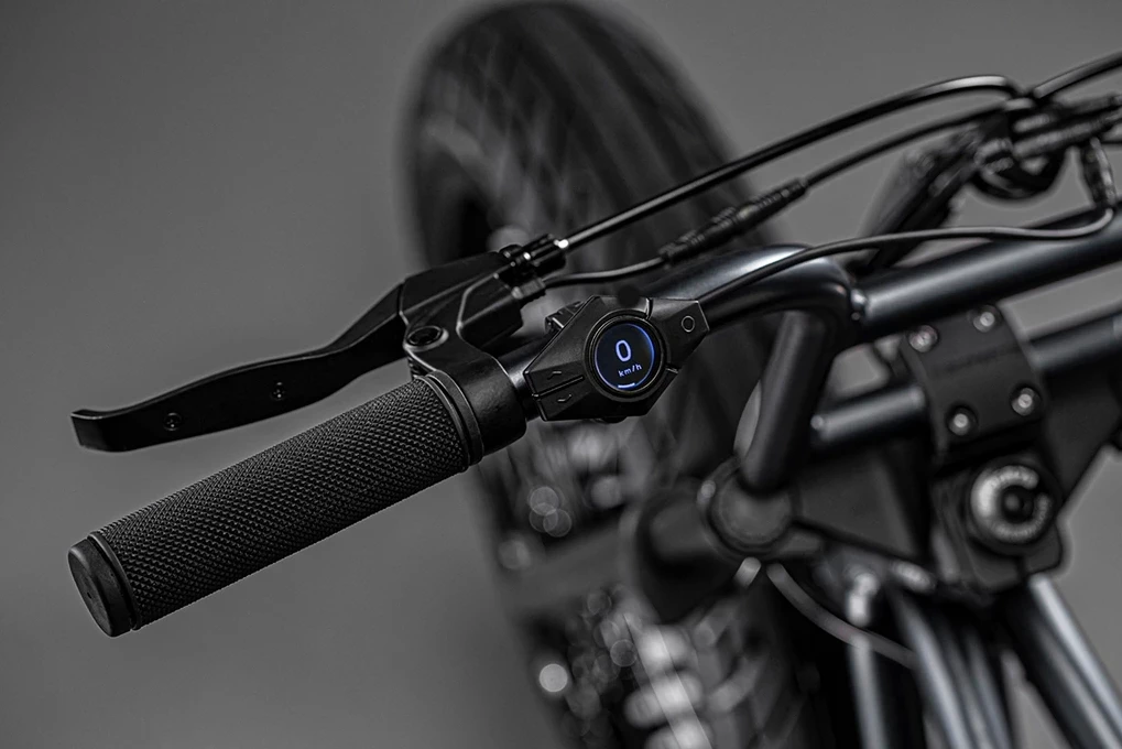 An LCD display on the handlebars of the Super73 ZX connects to a companion Super73 smartphone app for over Bluetooth