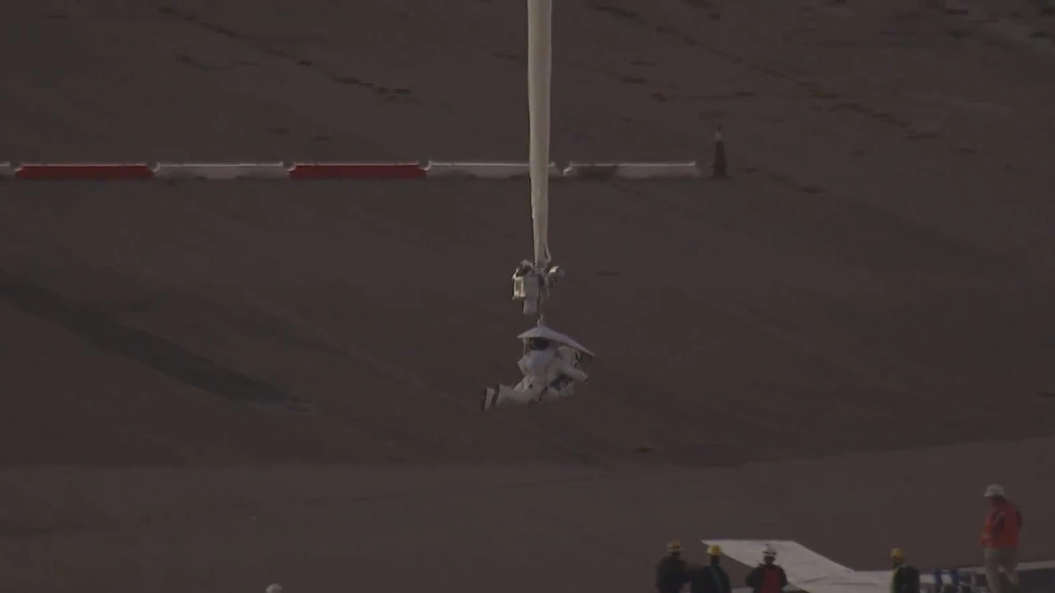 Alan Eustace starts his ascent dangling from a helium-filled scientific balloon (Photo: Atomic Entertainment and Paragon Space Development Corporation)