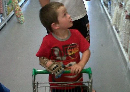 Liam outfitted with his "Robohand", which was created by Ivan Owen and Richard Van As
