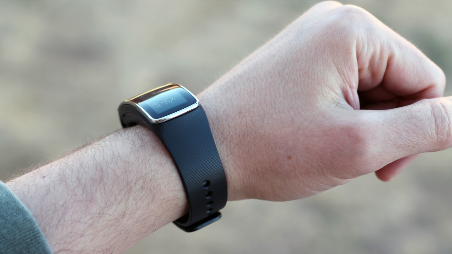 Unlike most full-fledged smartwatches, the Gear Fit is a narrow band with a curved display