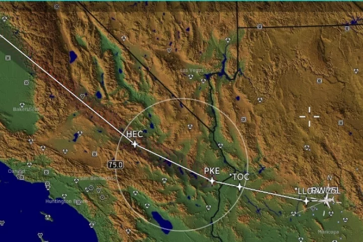 Honeywell's predictive software display shows unacceptable sonic booms will occur in the gray shaded area with red curves if the current flight plan is not modified