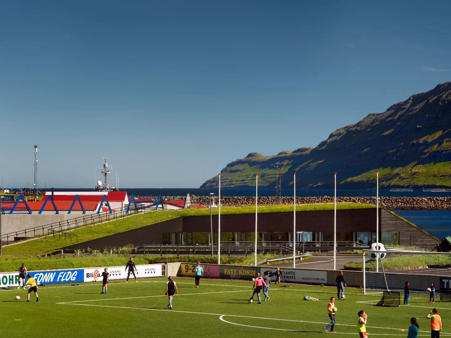 The new town hall for the people of Eysturkommuna, with a soccer pitch in the foreground