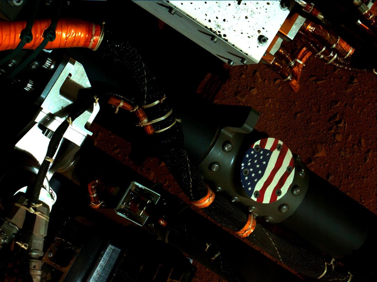 American flag medallion mounted on Curiosity (Image: NASA/JPL-Caltech/MSSS)