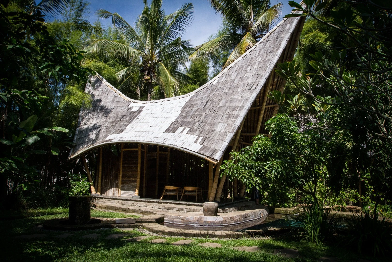 The Garden Villa's front yard hosts a private swimming pool and bamboo bungalow for lazy afternoons