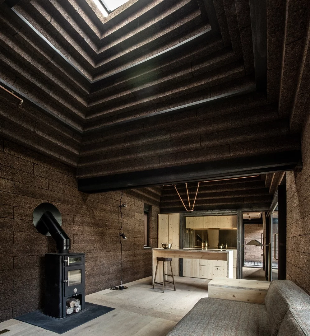 Cork House is an attractive home that's located in the grounds of a listed mill in Berkshire and is part-built using cork