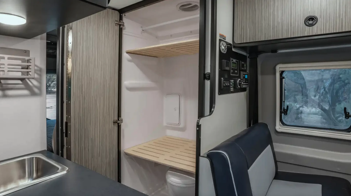 Except for its older door design, the wet bathroom is much the same between 2025 Revel 44E and Revel Sport 44N