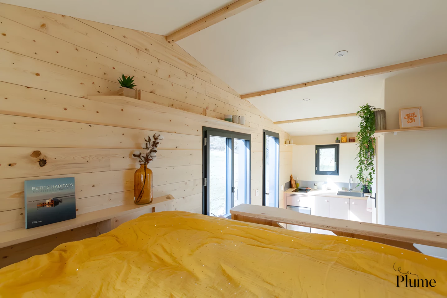 The Tiny house du Lac's interior is finished in spruce and poplar plywood