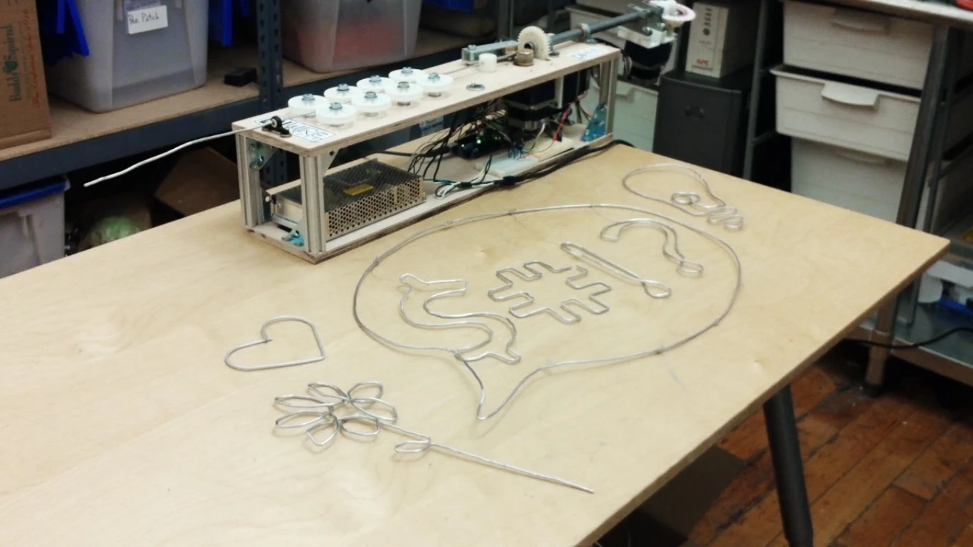 A New York design consultancy has built the DIWire Bender machine, which can bend and shape strips of wire into elaborate designs based on simple line drawings