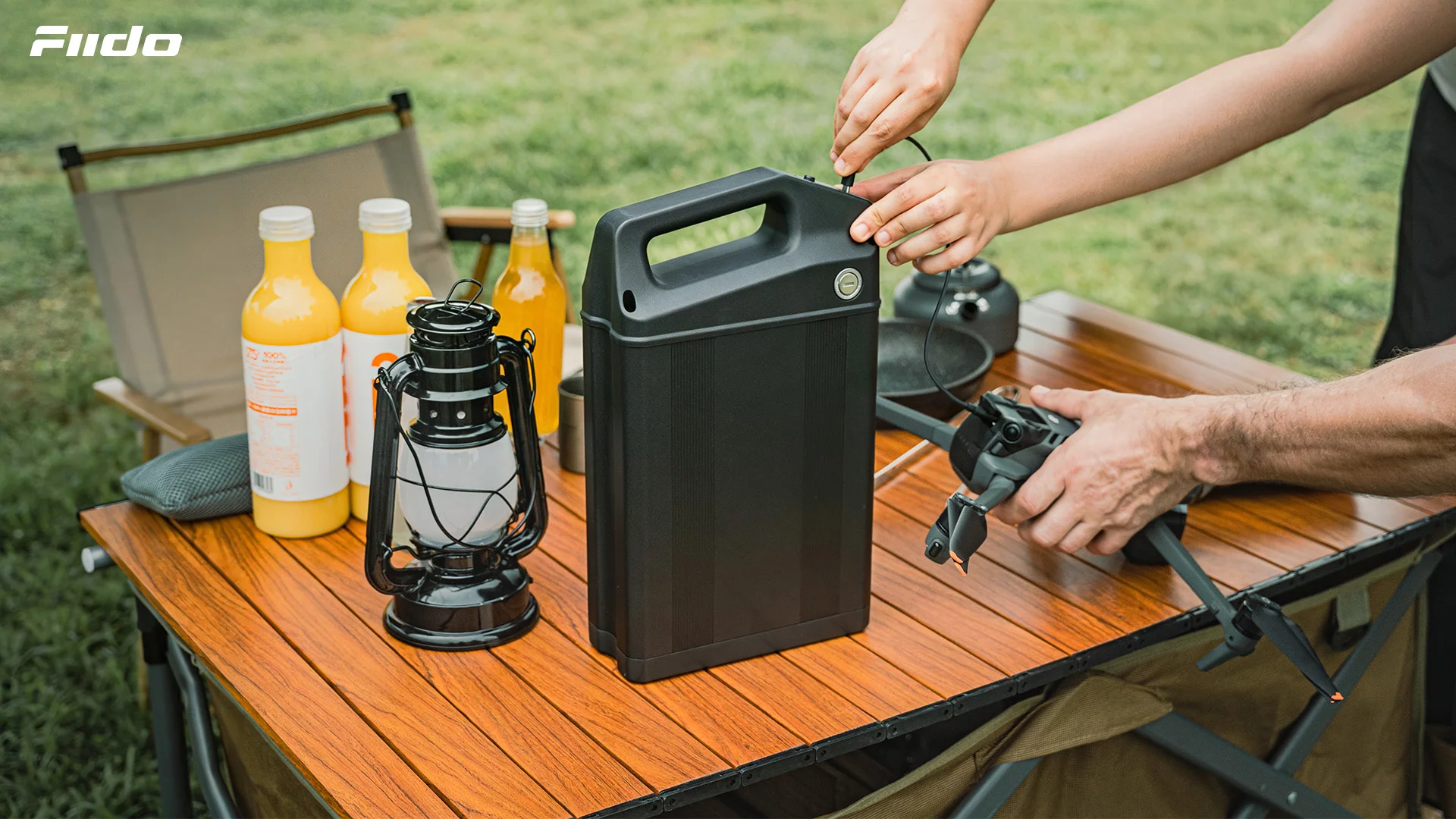 The 972-Wh battery pack can serve as a mobile power station at camp