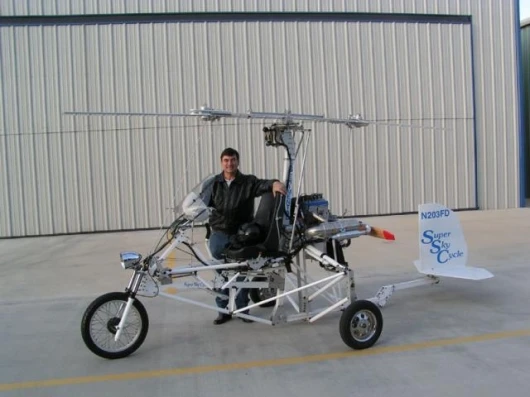 Larry Neal with the Super Sky Cycle