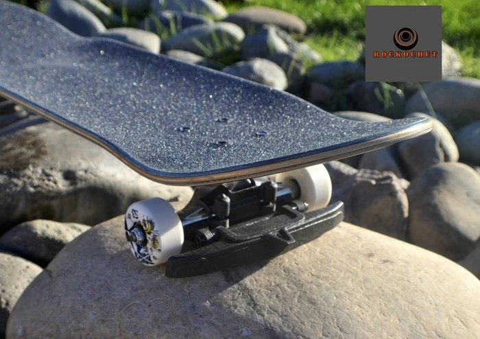 Rockochet mounted to the front of a skateboard