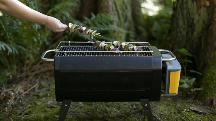 The BioLite FirePirt can accommodate charcoal in addition to wood, and features a grill top