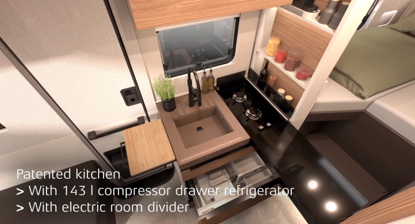 Galley in cooking mode with raised wall and cooktop cover deployed out for prep work