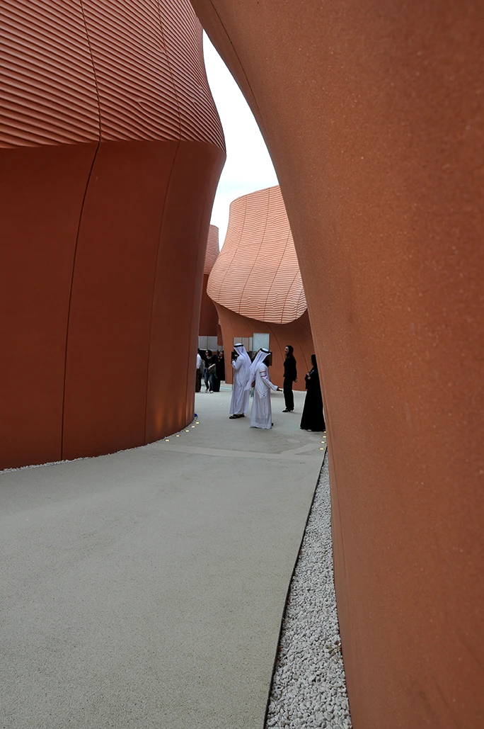 The structure provides protection from the sun and creates a shaded pathway for visitors