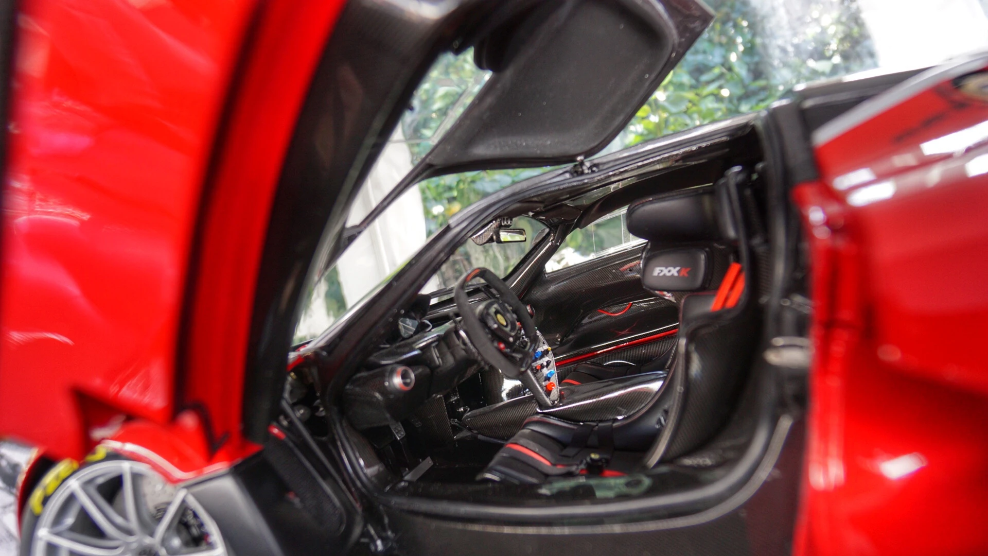 $6,775 buys you this model Ferrari FXX K, made to order 1:8 scale by Amalgam Fine Model Cars. It's so detailed that in photos it looks real.