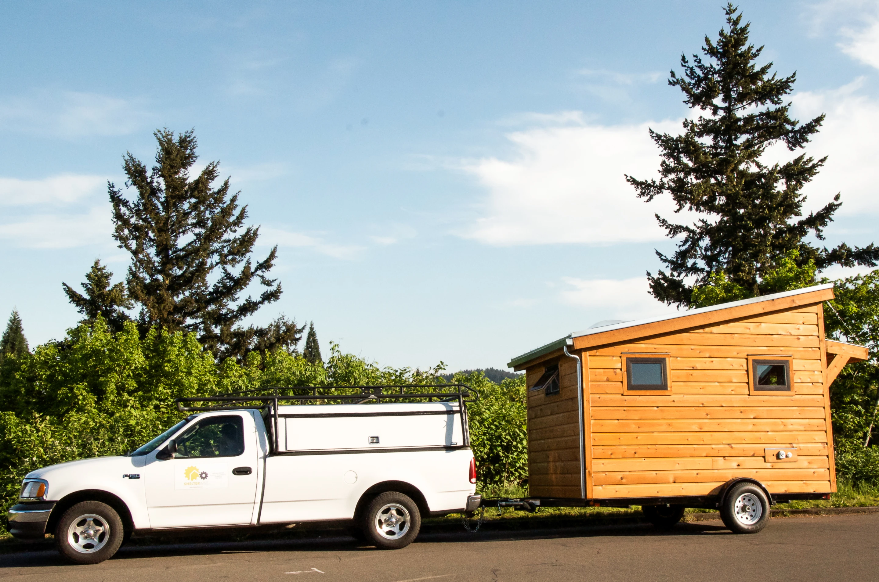 The tiny home can be put on a standard trailer and pulled by a car (Photo: Shelter Wise)