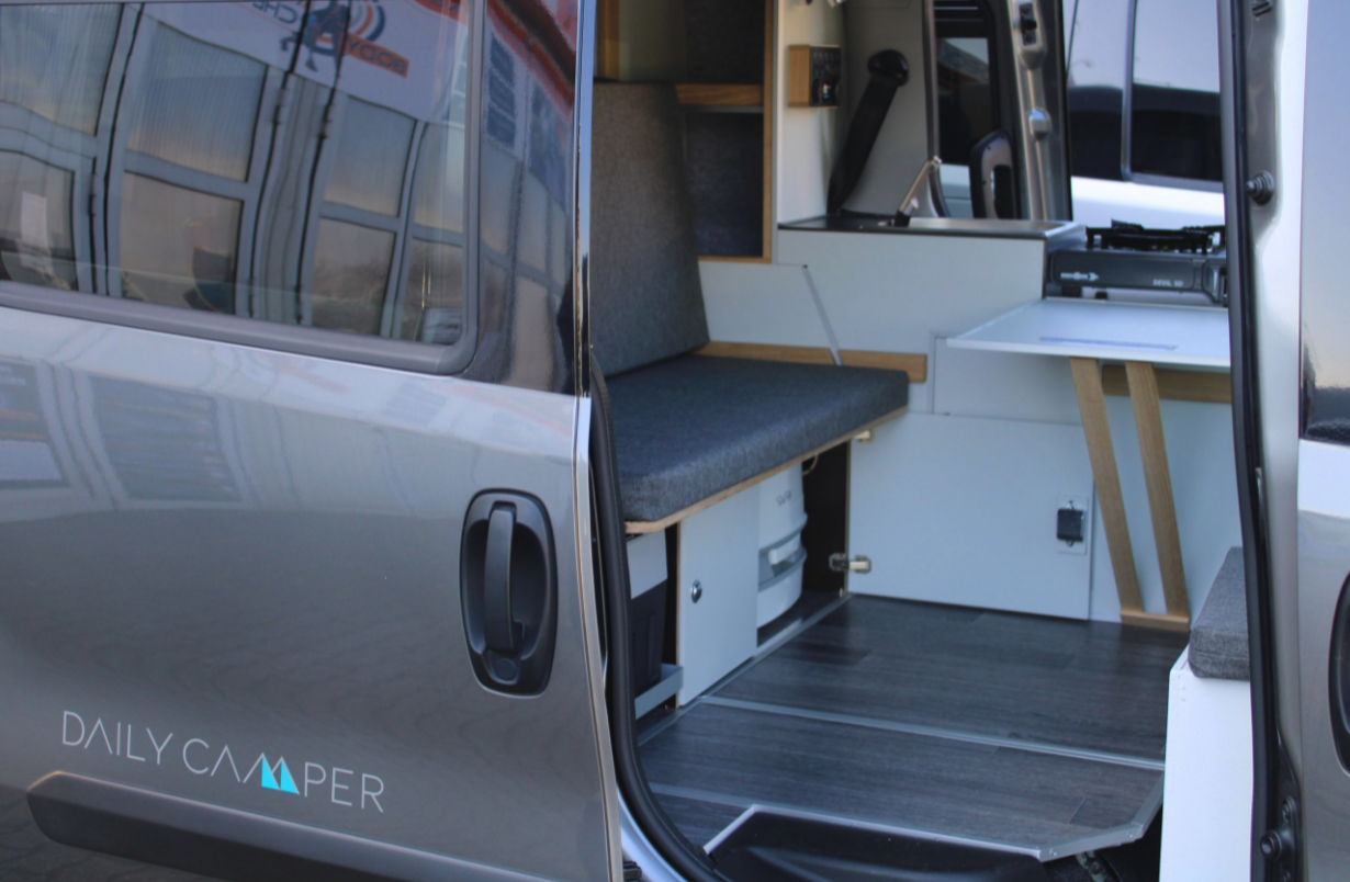 Both the fridge box and available portable toilet slide away below the bench